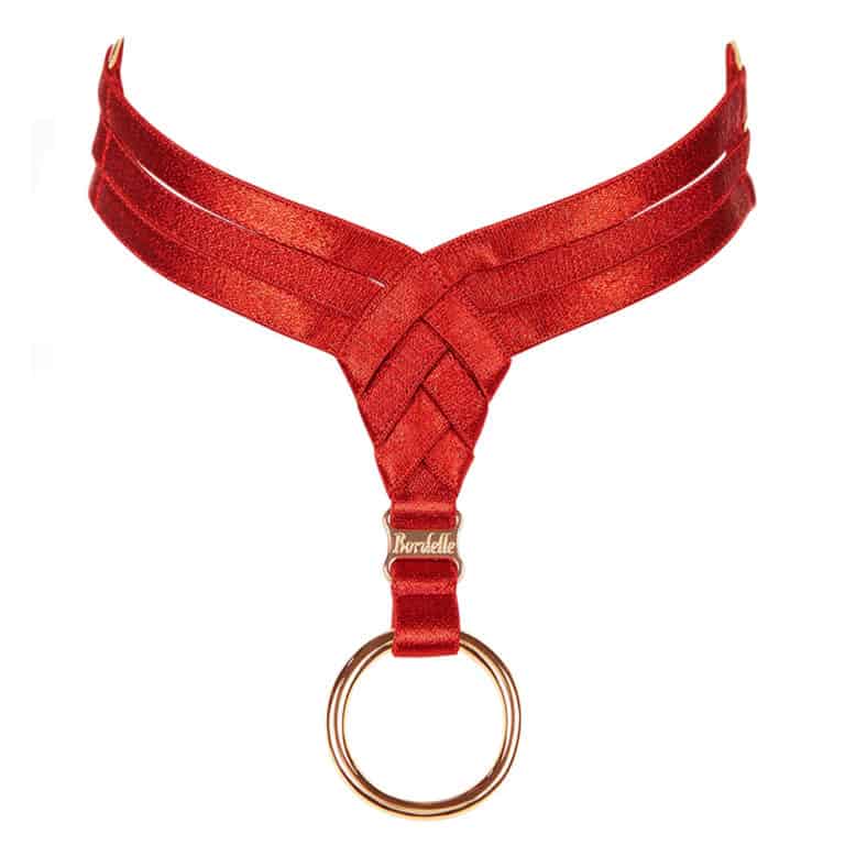 Red choker bondage necklace with triangle front and gold ring by Bordelle at Brigade Mondaine