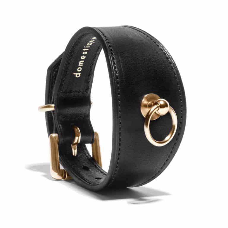 Bdsm bracelet in black vegetal leather and ring in the middle by Domestique at Brigade Mondaine