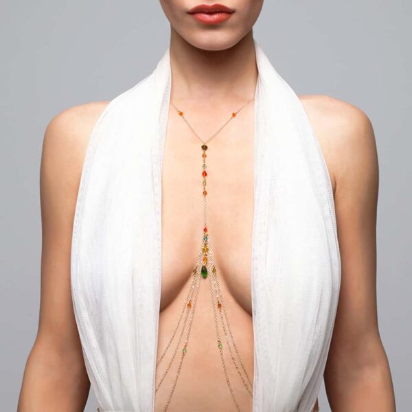Body jewelry with pendant between the breasts and multicolored FUNGI crystals at Brigade Mondaine