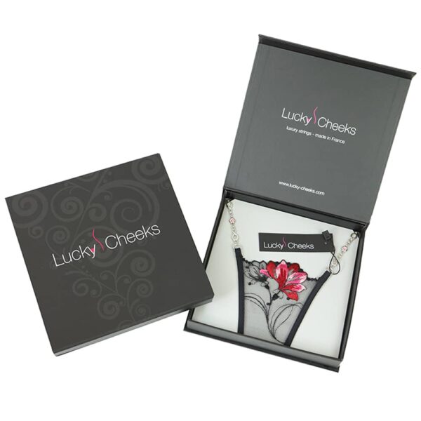 Black lace g-string with red and pink flower pattern by Lucky Cheeks at Brigade Mondaine