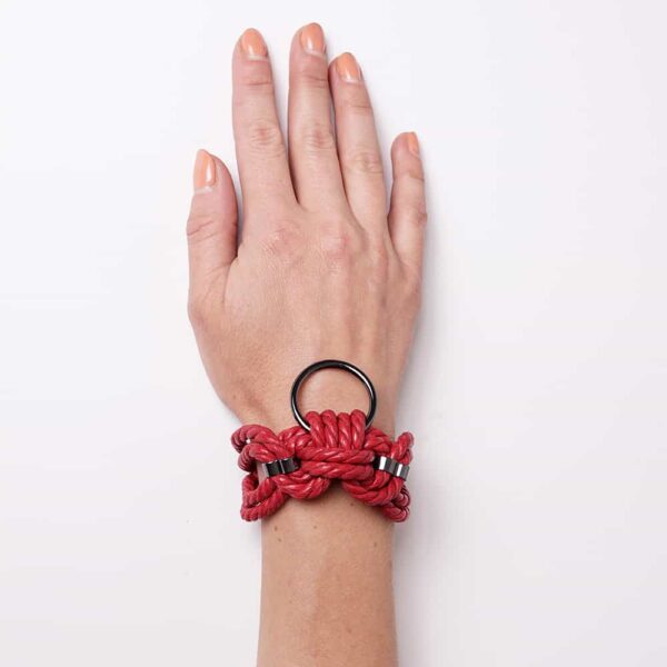 Red Shibari bondage rope bracelet with ring Figure of A at Brigade Mondaine