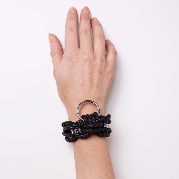 Shibari black bondage rope bracelet with Figure of A ring at Brigade Mondaine