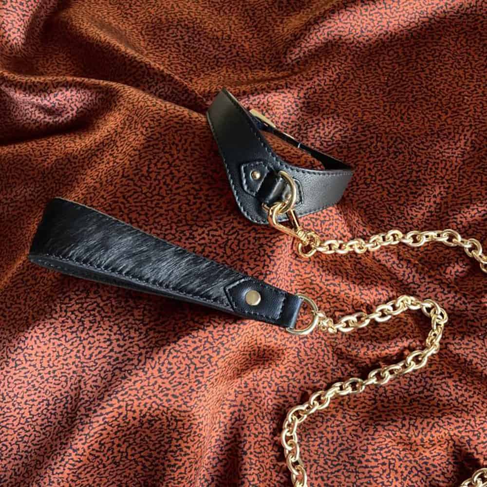 Gold chain leash for bdsm with leather toe cap