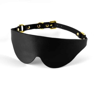 Augenmaske aus schwarzem Leder mit goldenem Finish UPKO bei Brigade Mondaine
