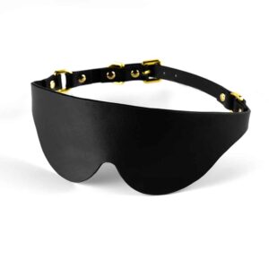 All black leather eye mask with UPKO gold finish at Brigade Mondaine