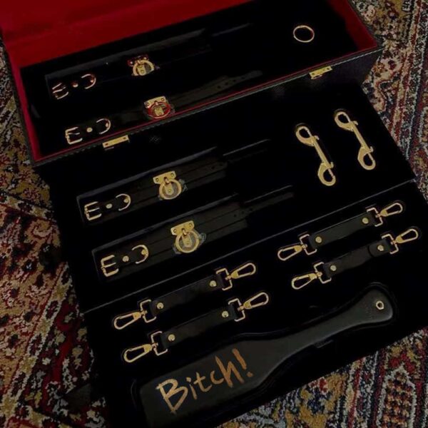 Trunk d'bondage and BDSM accessories in black leather and 24K gold entirely handmade and velvet bottom UPKO at Brigade Mondaine