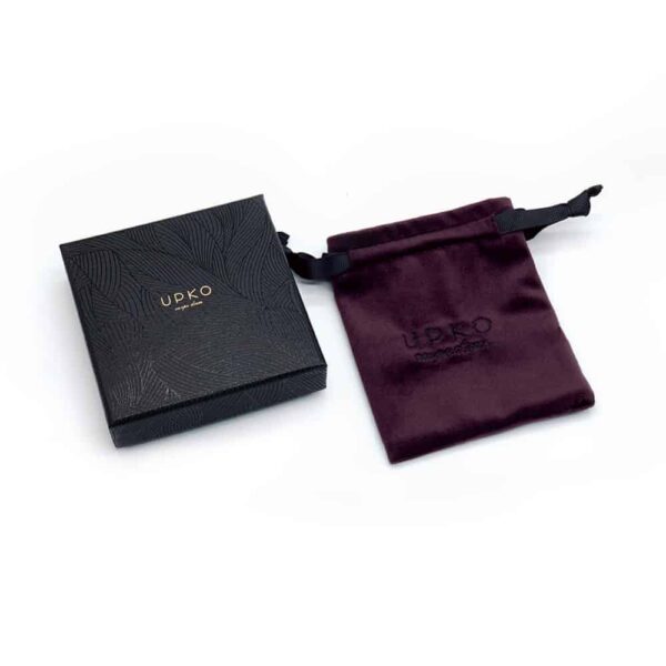 Packaging box UPKO with purple velvet pouch at Brigade Mondaine