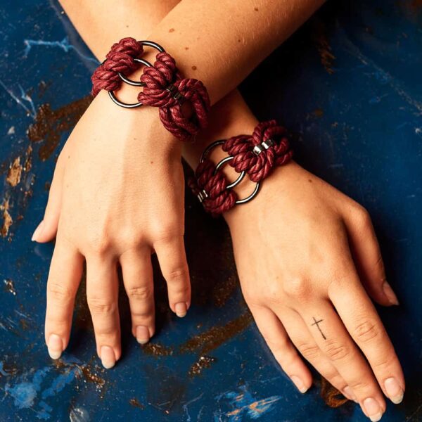 Bdsm bracelet in burgundy strings with silver details