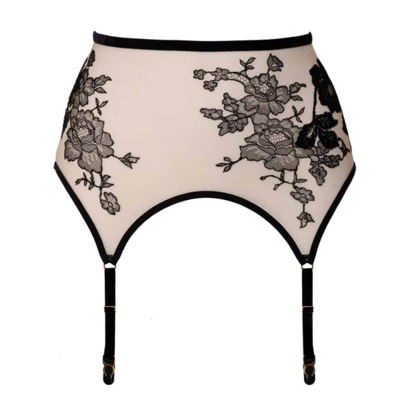 Yvéa Sunkissed suspender belt from Hervé by Celine Marie. The garter belt features a cream piece of fabric with black lace running from the hip to the elastics containing the 24 carat gold plated clips. A soft black velvet elastic band frames this piece of fabric. At the back, a small lacing is placed on the lower back and leaves the buttocks bare.
