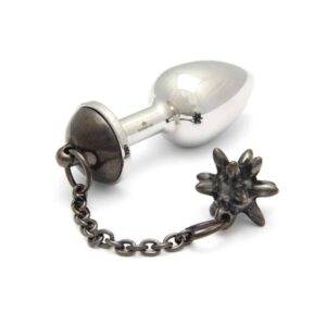 Plug anal de acero inoxidable d'un tamaño medio de la marca Rosebuds, para obtener más sensaciones, sin dejar de ser estético gracias a su accesorio de bola de bronce colocada suspendida en la parte trasera del plug.