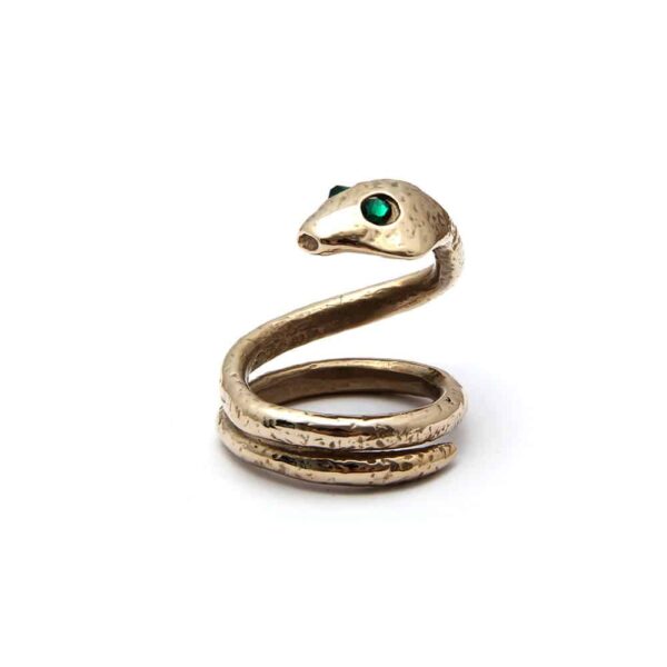 This is a ring in the shape of a snake. The snake has green emeralds for eyes. The tail of the snake curls up to form a wide ring.