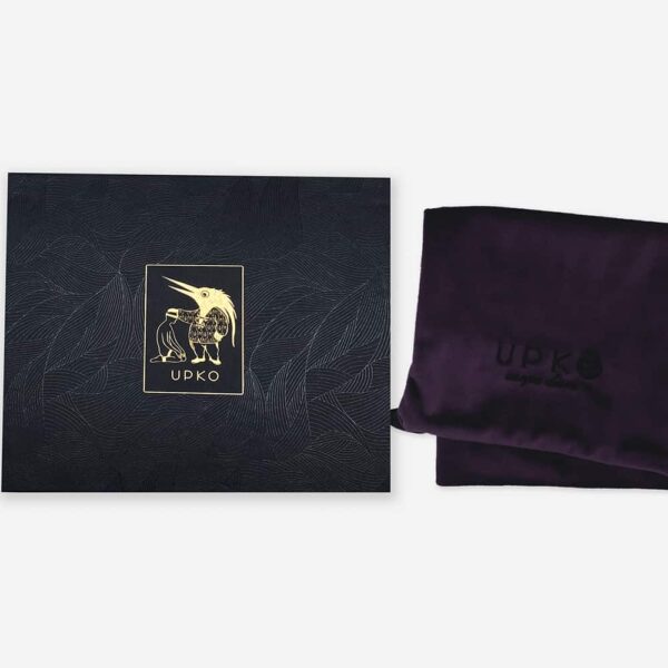 Black tropical patterned box from Upko and purple velvet pouch for Bondage Ankle Harness