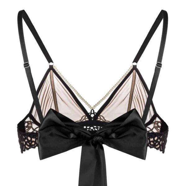 Transparent bra coquette of the brand BoundUp. The front of the bra is beige and slightly transparent. A black band runs across the middle of the cup. At the same time, above, there are beige beads that follow the movement of the cup, at the chest. Below, there is black lace. Regarding the back of the bra, to finish the path of the lace, there is a black ribbon bow.