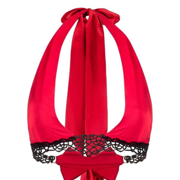 Halter bra Lady in red from the brand BoundUp. The fabric of the bra is a light silk-like material. It is tied in the neck and in the back with the red fabric. Towards the bottom of the bra, under the breasts, there is black lace all around the bra except for the part that ties in the back, which is in the same spirit as the top of the bra, that is to say, in a fabric with a light material and red color.