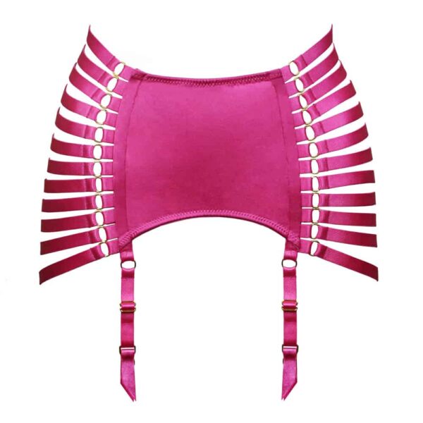 Matrix suspender skirt from the brand Kaimin. The product is a skirt with a large piece on the front that wraps the belly. On the hips fine elastics are arranged and joined at the back by two rows of rings. The whole is a full-bodied pink color and each elastic is adjustable.