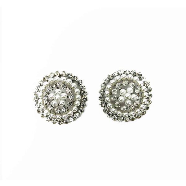 Ein Paar Nippies der Marke ELF ZHOU LONDON Signature aus Perle & Silber. Die Nippel strahlen durch die Zusammensetzung aus Perle und Silber.