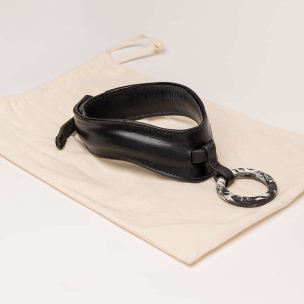Black leather choker necklace with a black and white marble middle ring by Adele Brydges at brigade mondaine