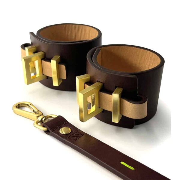 Handcuffs of the brand SPNKD chocolate color with 24 carat finish