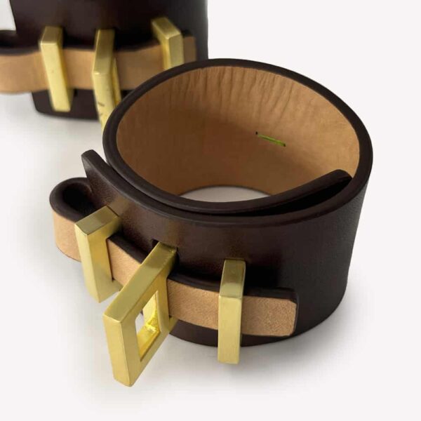 Handcuffs of the brand SPNKD chocolate color with 24 carat finish