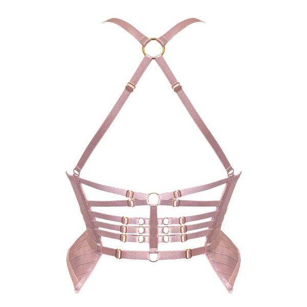 Basque from the Kora collection at Bordelle. This basque is pink. It is entirely made from thin green elastic. It attaches on the front with a zipper whose pull is embossed with the name of the brand. The bottom of the product leaves an empty space at the level of the zipper to let see the skin. The straps are thin and rest on the shoulders. At the back of the product, the straps are joined by a ring placed almost at the neck and then continue to the waist. The maintenance of the lower back is composed of small elastics, two that form a cross, then three tight elastics and finally a last elastic a little wider.