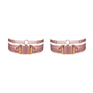 Garters from the Kora collection at Bordelle. These garters are pink in color, a thick elastic wraps the thigh and is embellished above a thinner elastic. The garters are adjustable and have two jewels embossed with the Bordelle logo on each side of the garters. The two elastics are joined by a round loop and a thin elastic placed between the two jewels.