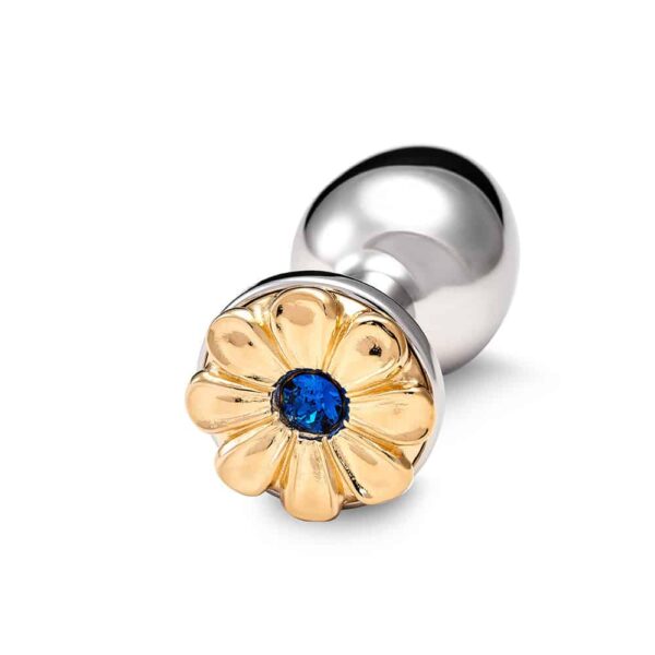 Accessory anal plug in silver bronze and flower decoration in gold and blue pistil.