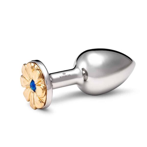 Accessory anal plug in silver bronze and flower decoration in gold and blue pistil.