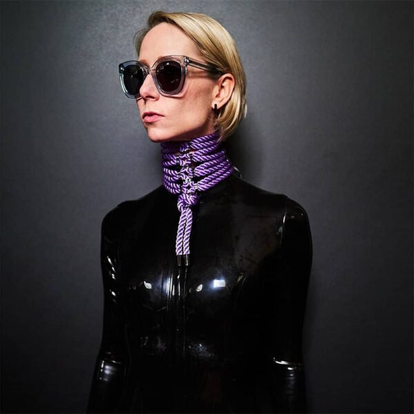 Woman wearing a neck harness figure of a Lilac
