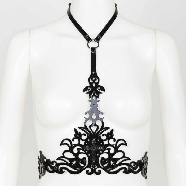 The Underbust Nero Harness is entirely handcrafted from laser-cut black patent leather and high-quality black crystal rivets; the SWAROVSKI® encrusted leather Underbust Nero Harness is a luxury fetish accessory designed to be seen.