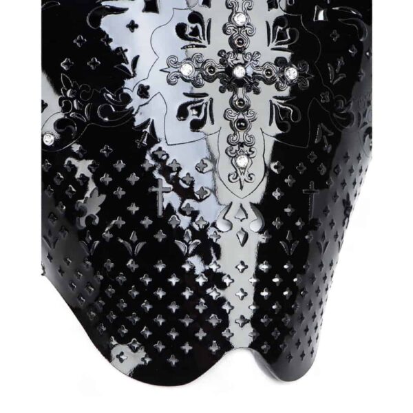 The confessional bolster is made entirely by hand and to order in Berlin, in the brand's workshops, from laser-cut black patent leather and black gold rivets; the Nero confessional bolster in black leather encrusted with SWAROVSKI® is an extraordinary luxury fetish accessory.