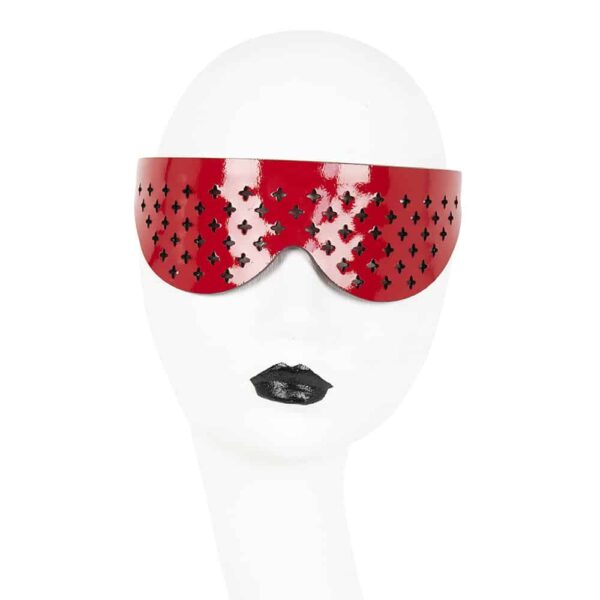 The Rosso Confessional Mask is entirely handmade in the brand's Berlin workshop from patent leather, this Rosso Confessional Mask will be a surprise to your partner. The laser cuts on the eyes add a touch of glamour to the ensemble. Whether in the boudoir or in the city, accessorize any outfit! We'll forgive you anything in the confessional...