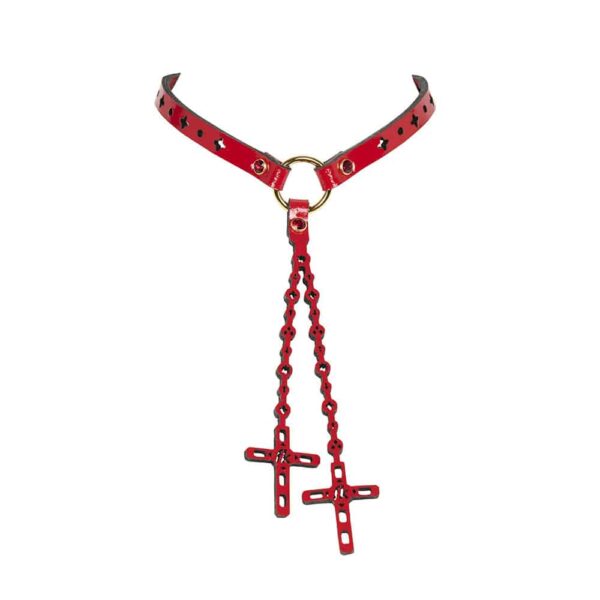 The Rosso rosary necklace is the perfect statement piece! Entirely handcrafted to order in the brand's Berlin workshop from glossy red laser-cut patent leather, gold trim and Swarovski® crystal rivets.Rosary and necklace in glossy red laser-cut patent leather Crystal rivets edged in red Siam SWAROVSKI® gold Large gold-plated lobster clasp.