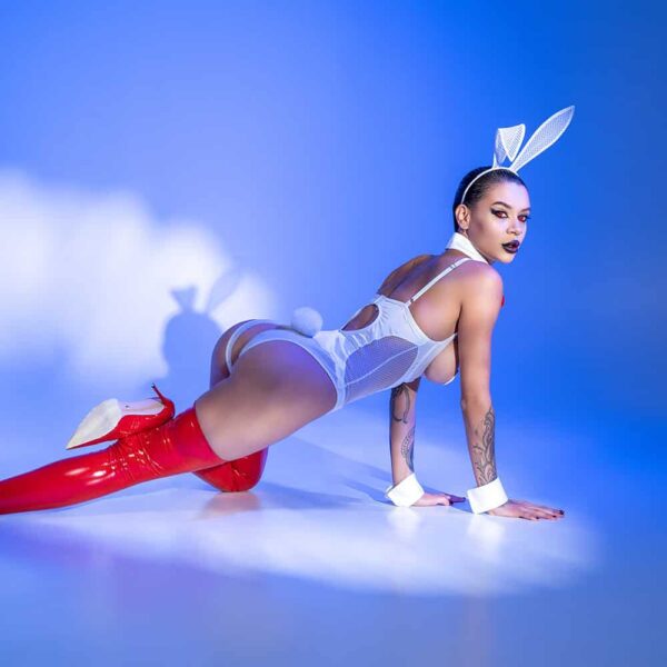 baed stories costume worn by model on blue background, sexy bunny outfit