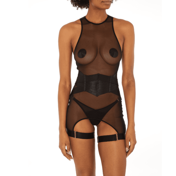 The Bordelle set of the Kora collection consists of:The Kora Garters Dress in fine fishnet is a classic reinvented. A piece made to be on top or underneath, layered like an accessory. Experiment with new style ideas! A fully open back to the kidneys. A sexy and versatile piece to have in your lingerie wardrobe. Swan hook back closure. All straps are adjustable. Wide, stretchy, adjustable straps for maximum comfort. Wear it alone or with the 24K gold plated Bordelle nippies.The Kora Thong can be worn with any look from the Kora line. Combining both soft and sheer mesh, the Kora Thong is a delicate balance of classic and contemporary. 24 karat gold plated finish. Fully adjustable to your body shape. Maximum comfort guaranteed. 2 pieces in 1, the Kora suspender belt can also be worn as a corset belt, once its 4 removable suspenders are removed. A versatile and elegant piece of lingerie composed of elasticated satin inserts, adjustable via 24 carat gold-plated sliders at the back of the waist. Closes with a large 24 karat gold-plated zip. All elastic straps are adjustable to your morphology for a guaranteed comfort. Garter clips to use with suspenders or stockings. Wear this piece with a Kora lingerie set and dare to wear it over a tight dress, jumpsuit or pencil skirt for a sensual look. This set is available at Brigade Mondaine.
