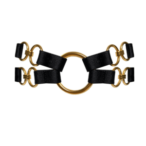 The Kleio Bondage Necklace is a small piece of lingerie inspired by the bondage-luxe aesthetic. Featuring a fully adjustable satin elastic strap, embellished with an oversized center O-ring and secured with a swan hook closure, the Kleio Discreet Bondage Necklace is the perfect finishing touch to any lingerie ensemble from the Bordelle collection. It is available at Brigade Mondaine.