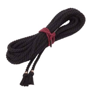 Black Bondage Rope has the look and feel of jute or hemp, but is made from triple-thickness spun polyester yarn. The rope is washable, non-allergenic and very long lasting. It is soft on the hands and does not stretch. The rope has a gold finish and a Matthew Walker knot, a decorative knot used to prevent the end of a rope from fraying. Suitable for all levels of tying and hanging. Available from Brigade Mondaine.
