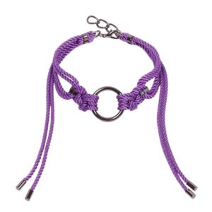 This elaborate and fitted Shippo Lilac Choker features a large O-ring with traditional symmetrical polyester rope knots, with long loose tails framing the neck. It is finished with silver zinc alloy and brass hardware. A clasp and chain at the back can be adjusted for a custom fit. One size fits all. Available at Brigade Mondaine.