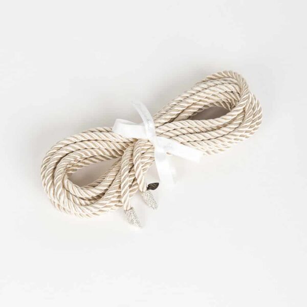 Shibari Rope Bianco from Fraulein Kink on Brigade Mondaine.Entirely handmade and made to order in Berlin, in the brand's workshops, from silk rope; the Shibari Rope Bianco is an extraordinary luxury bondage accessory. Add some sexy sparkle to your boudoir with the 5 meter long white and gold crystal tipped bondage lasso. Transform the lasso into a belt or harness to add a special fetish touch to your favorite outfit.
