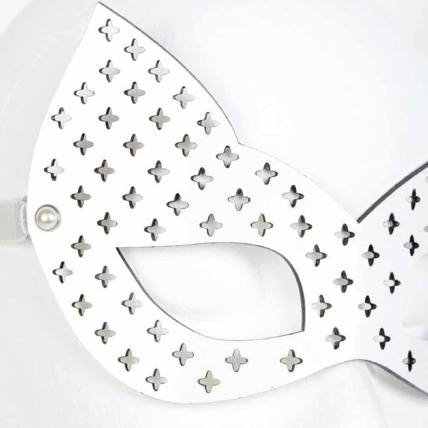 Bianco Blanc Fräulein Kink cat mask on Brigade Mondaine, entirely handmade and made to order in the brand's Berlin workshop from laser-cut and molded patent leather. Perfect for accessorizing an outfit, it will highlight your eyes and give you a doe-eyed look that will make you irresistible! Adjustable with an elastic band.white patent leather laser cut kitten mask made to measure. Ivory Pearl Silver Double Cap Rivet Trim. Adjustable headband with double-sided satin elastic ribbon.