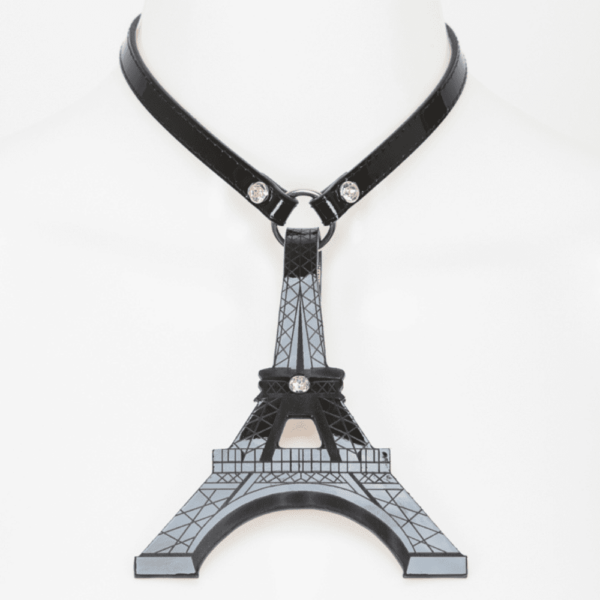Eiffel necklace from the French Kiss collection by Fraulein Kink on Brigade Mondaine. Add a glamorous touch to your look inside and outside the bedroom. Patent leather choker with a detachable laser embossed Eiffel Tower. The entire French Kiss collection is handcrafted to order in the designer's studio in Berlin. This collection is inspired by French luxury with accessories that represent the fashion capital, Paris. Fraulein kink offers couture pieces that you won't see anywhere else.