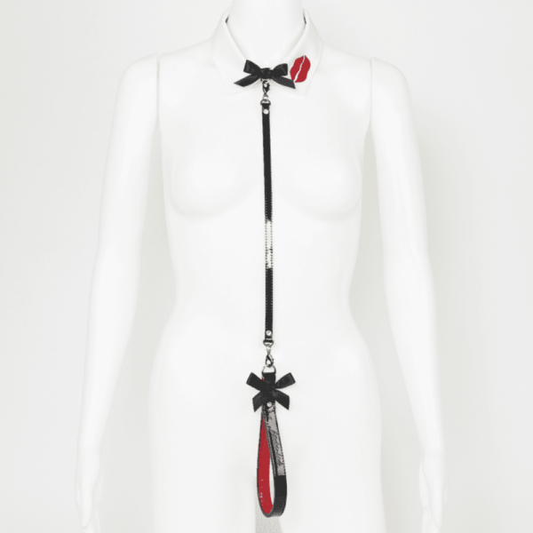 White collar and leash set in black and red patent leather from the French Kiss collection by Fraulein Kink, available at Brigade Mondaine