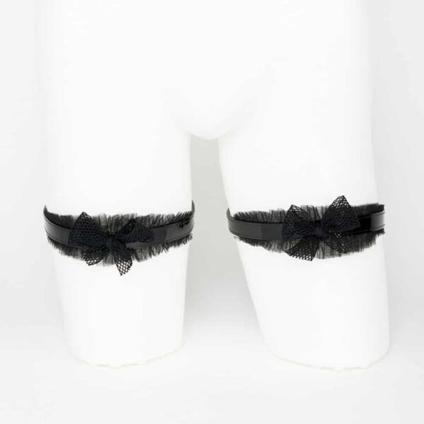 Black patent leather and tulle garters from the French Kiss collection by Fraulein Kink, available at Brigade Mondaine