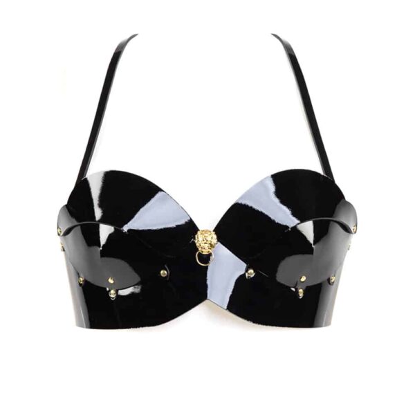 The Leone strapless bra is one of the highlights of the Riche collection. This luxurious piece is made to be seen! Very chic, the Ricco black Italian patent leather bra has eye-catching gold lion head detailing, removable straps, gold brass double cap rivets, it can be worn both over your favorite silk blouse or dress, or directly on the skin. Black adjustable and removable bra straps. Stretchy and adjustable back hook closure. Available in 3 sizes.