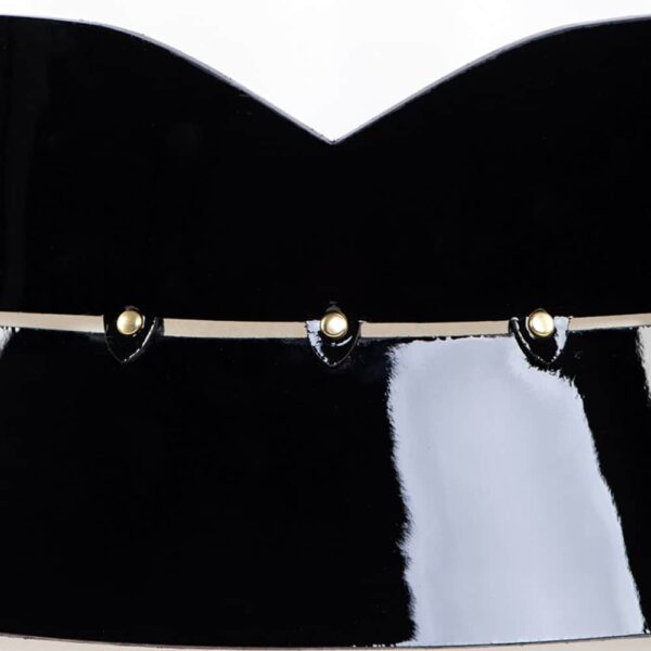 Leone Belt Garter, the creation inspired by the ultimate essence of glamour. The Leone belt has adjustable and removable leather suspenders. Wear this luxurious creation with lingerie or over a pencil skirt for a high fashion look. Removable leather and satin elastic leg straps. Gold brass double cap rivets. A fashionable and versatile piece! Available in 2 sizes.
