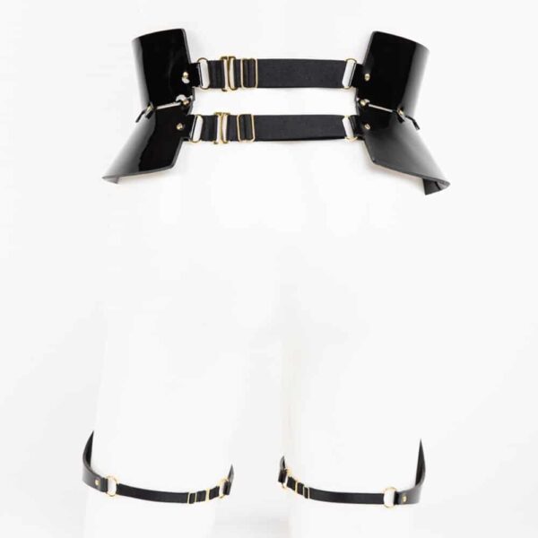 Leone Belt Garter, the creation inspired by the ultimate essence of glamour. The Leone belt has adjustable and removable leather suspenders. Wear this luxurious creation with lingerie or over a pencil skirt for a high fashion look. Removable leather and satin elastic leg straps. Gold brass double cap rivets. A fashionable and versatile piece! Available in 2 sizes.