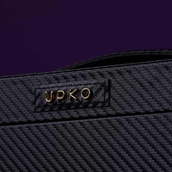 black and gold trunk with diagonal pattern UPKO