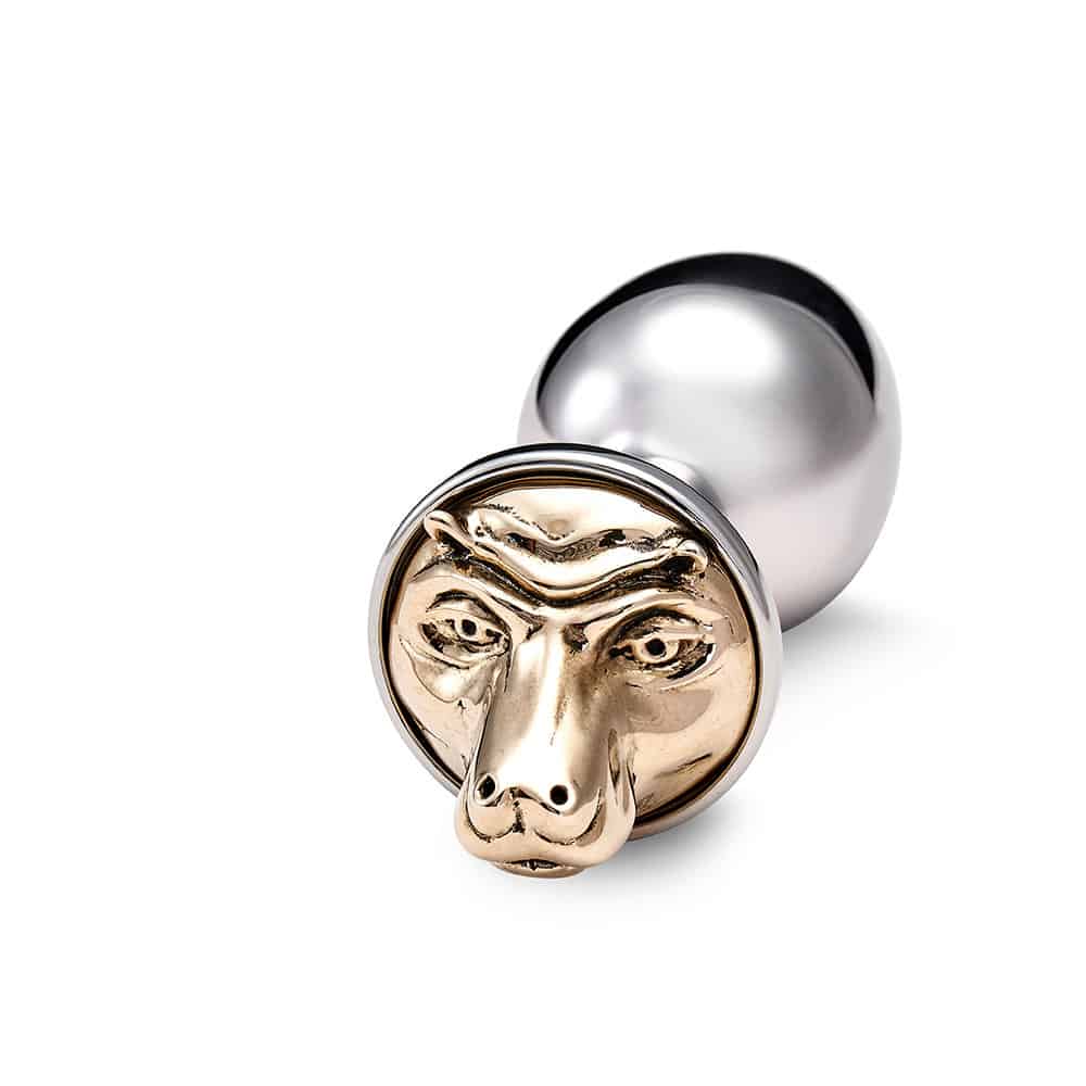 Accessory anal plug in silver bronze and hippopotamus head decoration in gold.