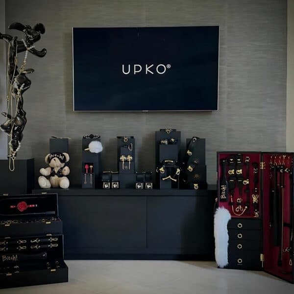 Several UPKO Sade Trunk 20 pieces on the floor with UPKO plush.