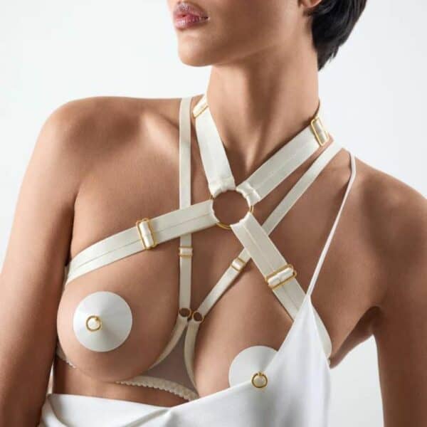 Woman wearing a white Bordelle Signature lingerie set.