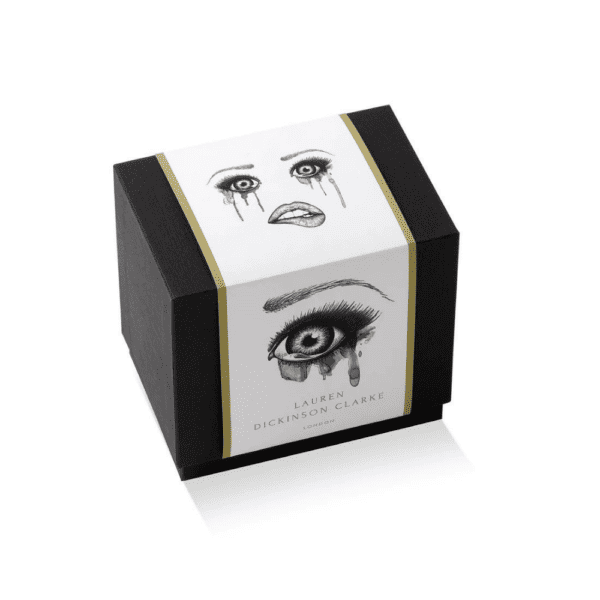 The packaging, specially designed for the poet candles, is black with eye illustrations, complemented by an elegant gold finish.